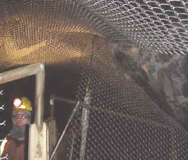 Wire  mesh used in tunnel roof to catch rocks that may work loose over time. 