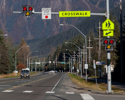 Photo of crosswalk with HAWK signal installed